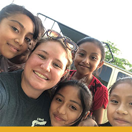 Image of Shaw and local children in Mexico