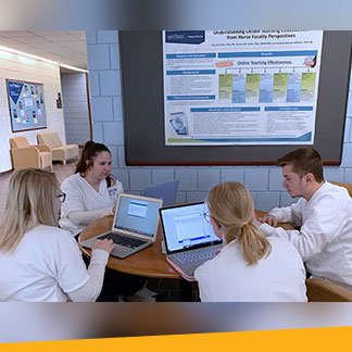 Image of nursing students doing research