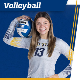Student holding a volleyball