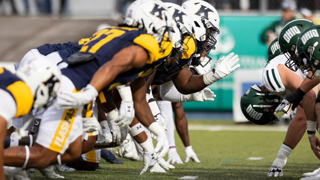 Image of Kent State Golden Flashes Defensive Line in action